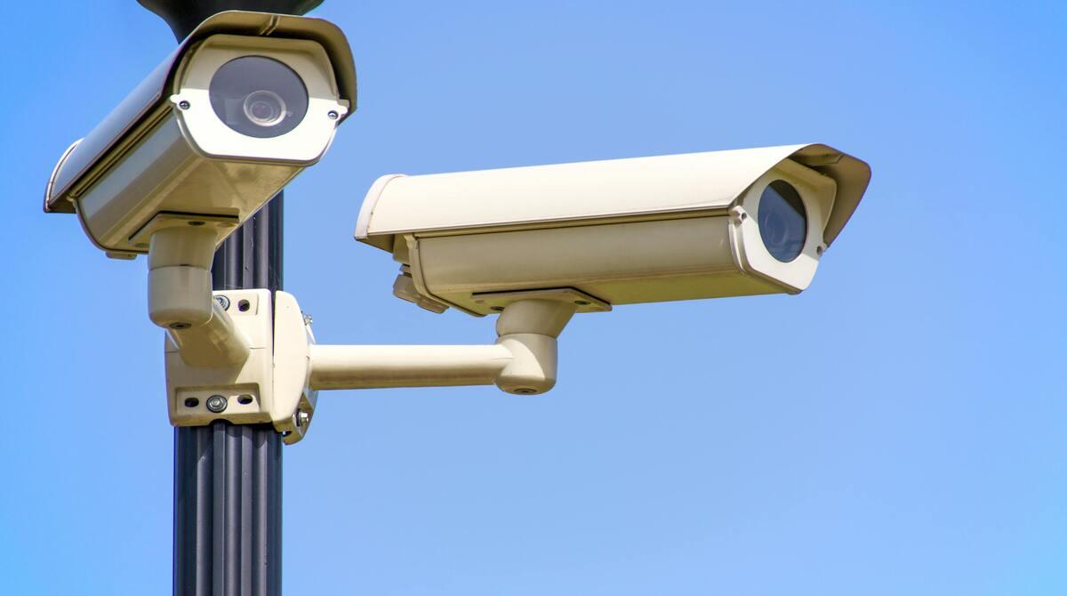 Would you rather live under total government surveillance that guarantees safety, or complete privacy if it enables crime?